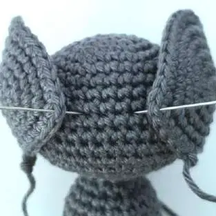 Both crochet bat ears pinned to the head, seen from the front