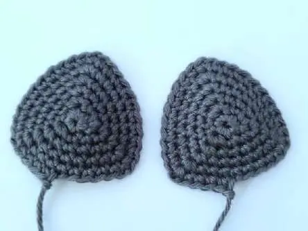 Two small flat gray crochet bat ears