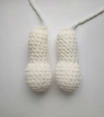 Two cream crochet bunny arms, stuffed