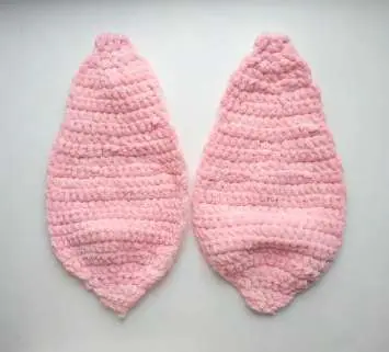 Two flat light pink crochet bunny ear pieces