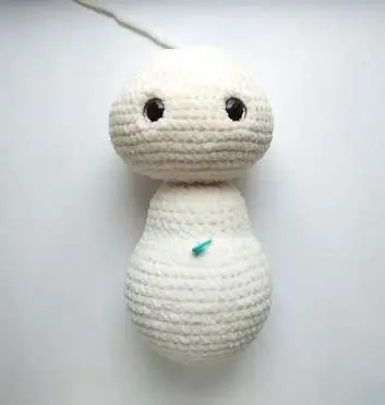 Cream crochet bunny head and body with black glitter safety eyes