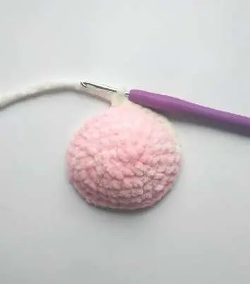 Pink oval foot sole of the crochet bunny leg